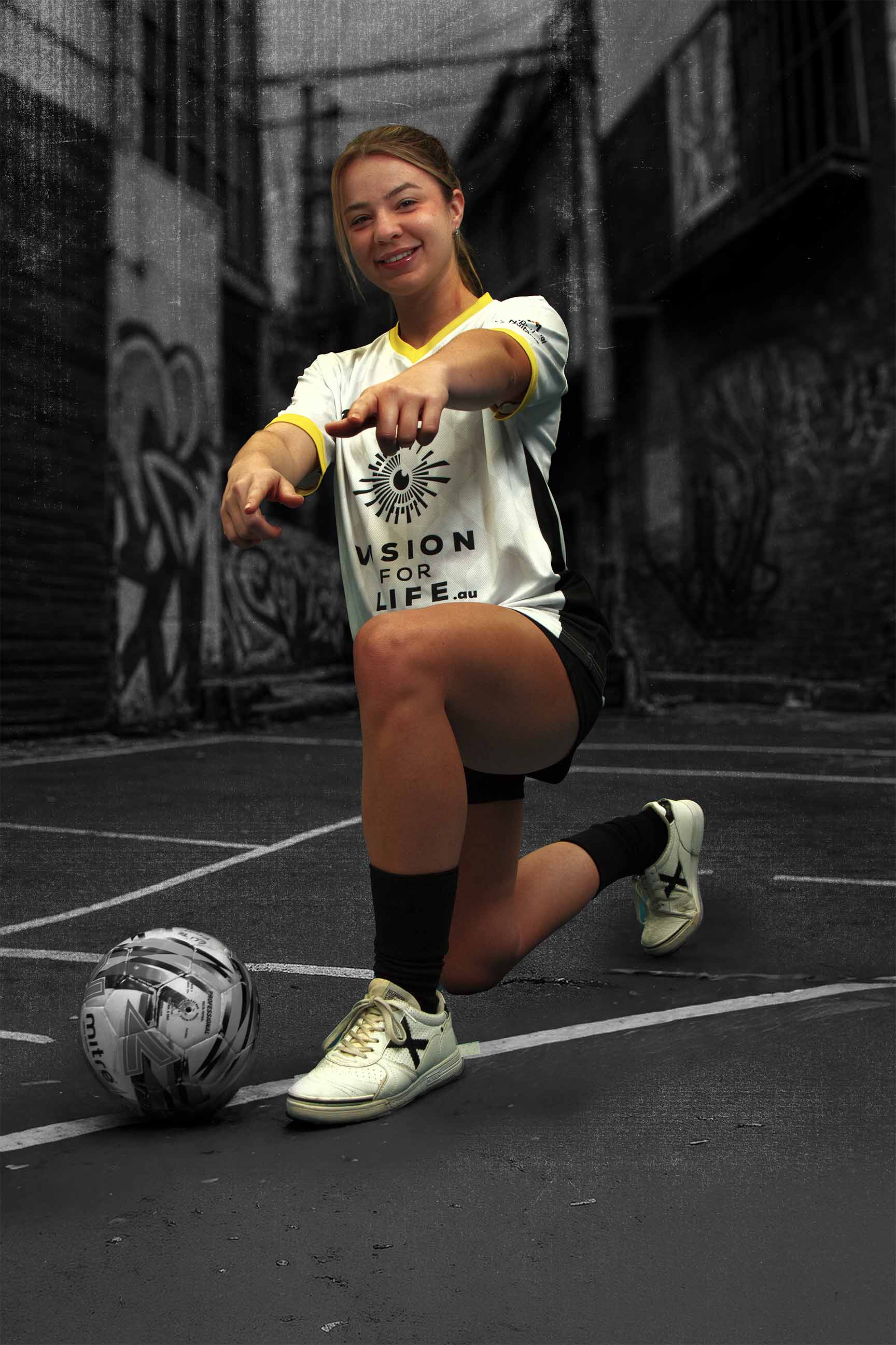 Female player pointing at camera.